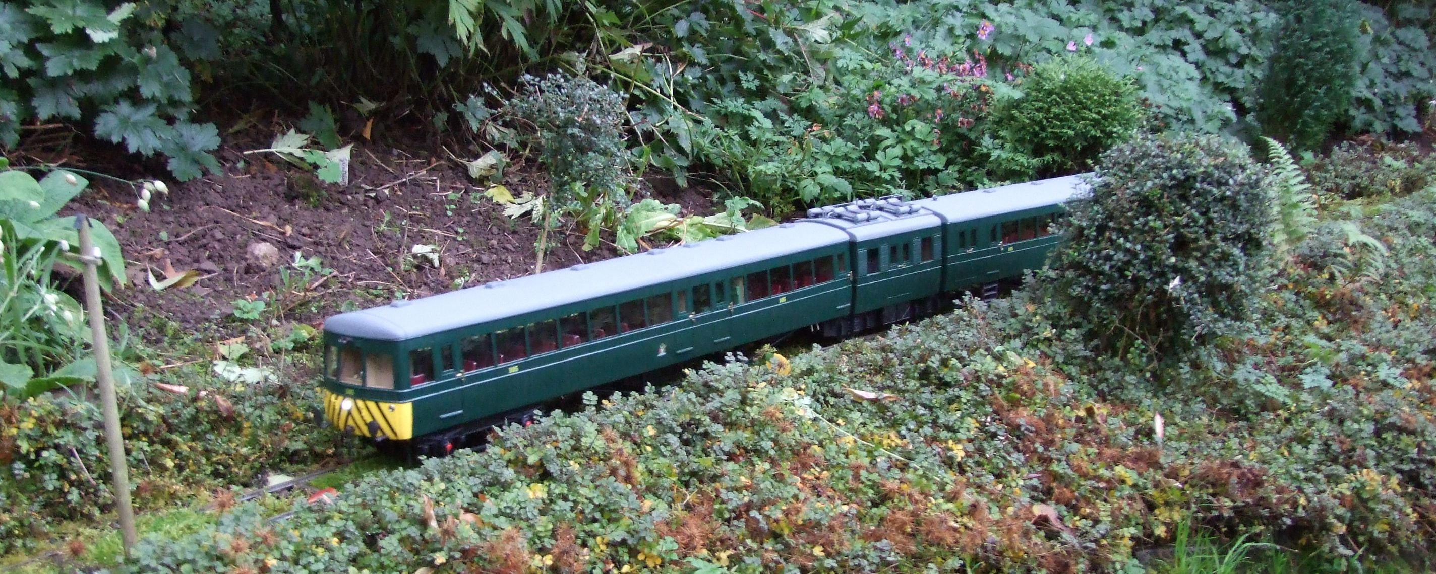 Neill Ramsay's railcar touring his garden.