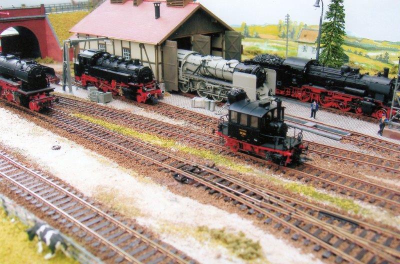 A full line-up of motive power outside the small engine shed - BR23 2-6-2, BR86 2-8-2T, BR62 4-6-4T, BR98.3 0-4-0T 'Glaskasten', and BR38 (a former Prussian P8) 4-6-0.